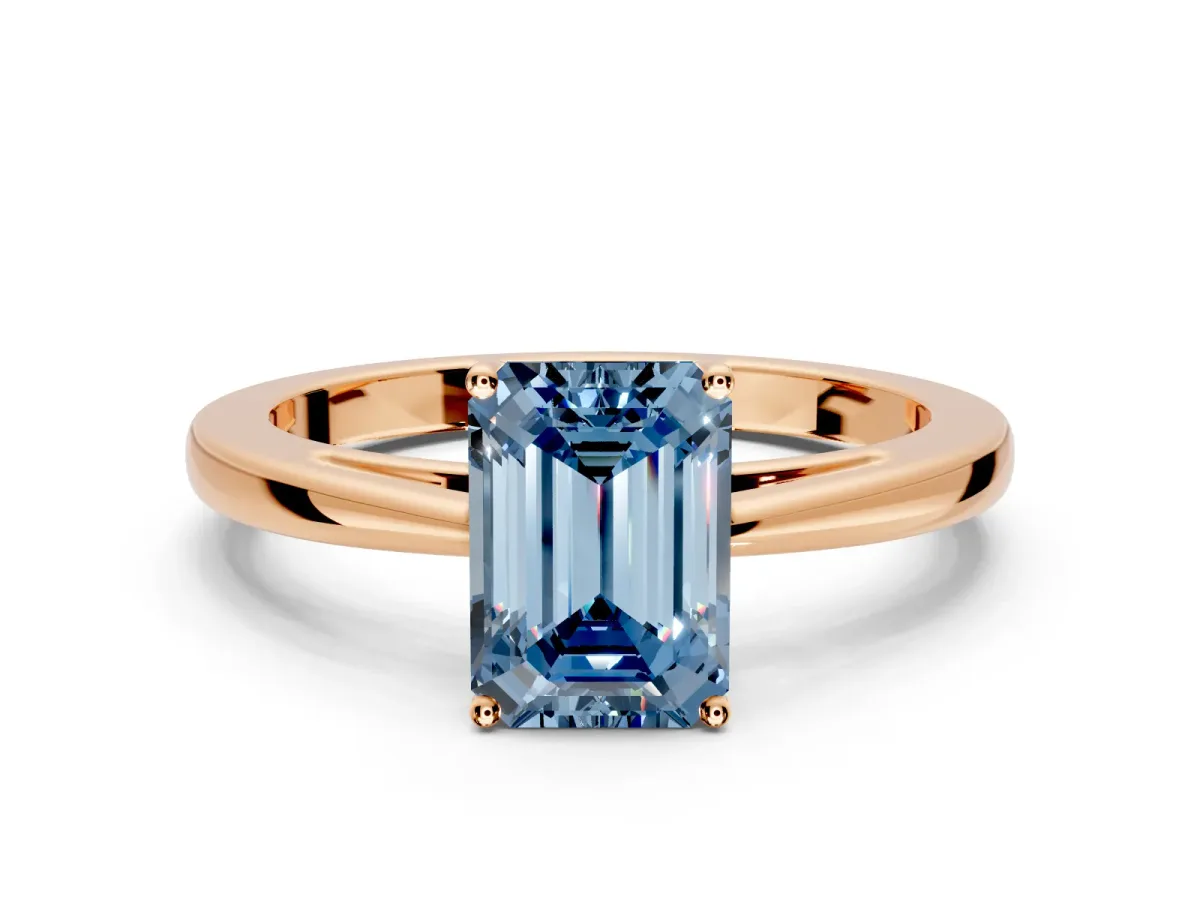 Solitaire Engagement Ring Setting for Fancy Blue Emerald Cut Center with Open Cathedral Shoulders and Prong Head in Rose Gold