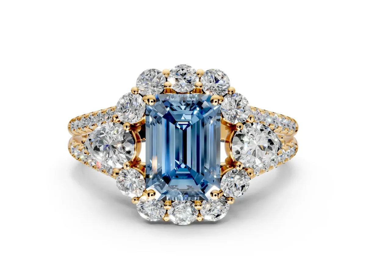Halo Engagement Ring Setting for Fancy Blue Emerald Cut Center with Two-Strand Split Shank and Prong Head in Yellow Gold