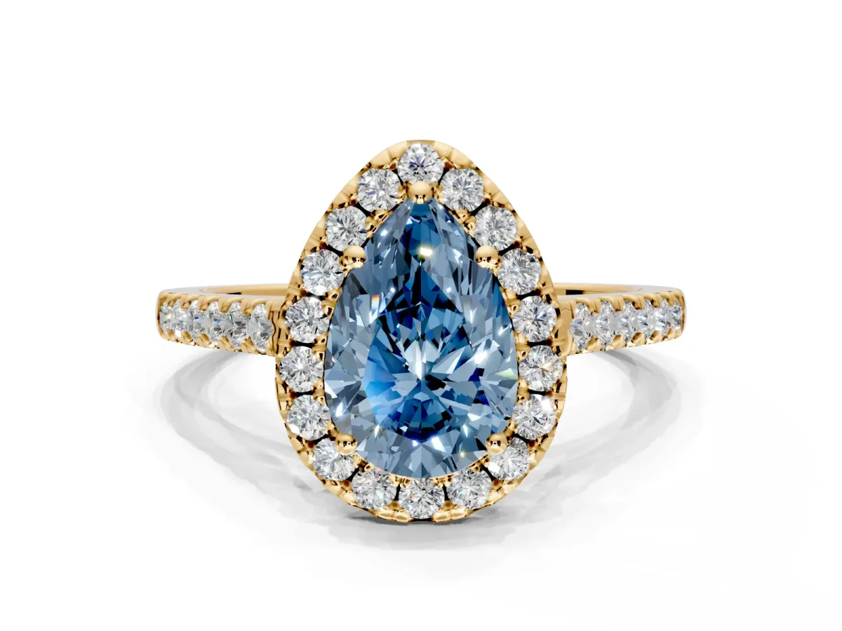 Halo Engagement Ring Setting for Fancy Blue Pear-Shaped Center with Narrowing Pave Band and Prong Head in Yellow Gold
