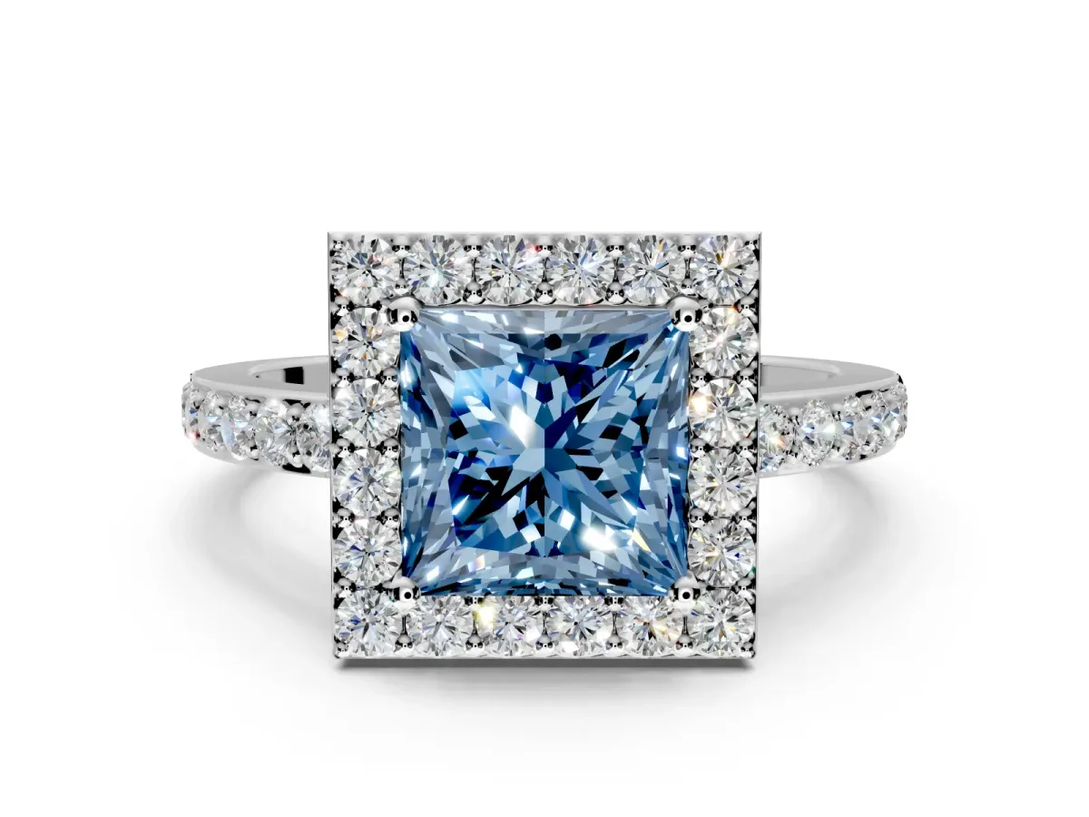 Halo Engagement Ring Setting for Fancy Blue Princess Cut Center with Heart-Shaped Openwork, Pave Band and Prong Head in White Gold