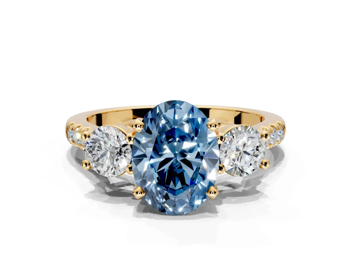 3 Stone Engagement Ring Setting for Fancy Blue Oval Center with Crossover Basket, Pave Band and Prong Head in Yellow Gold