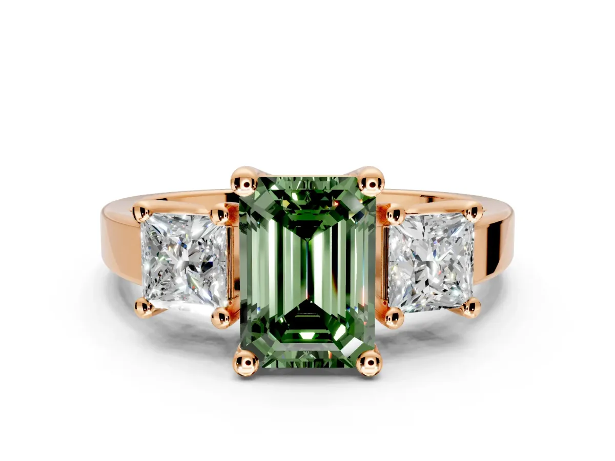 3 Stone Engagement Ring Setting for Fancy Green Emerald Cut Center with Matching Side Accents and Prong Head in Rose Gold