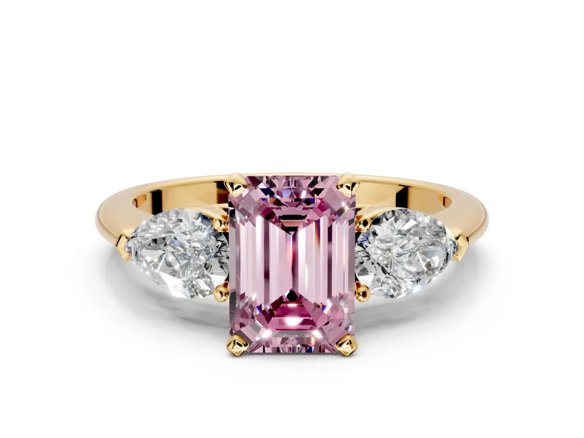 3 Stone Engagement Ring Setting for Fancy Pink Emerald Cut Center with Large Pear-Shaped Accents and Prong Head in Yellow Gold