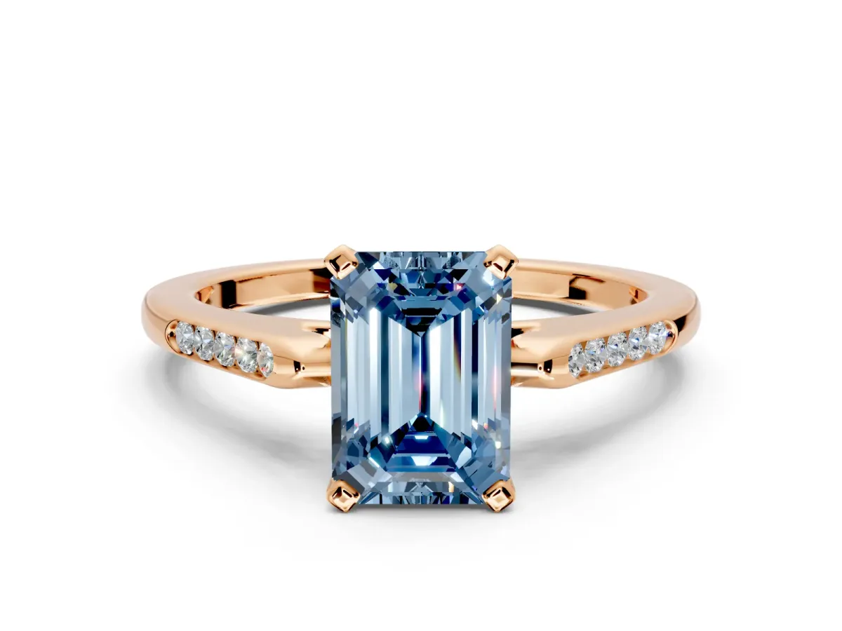 Solitaire Engagement Ring Setting for Fancy Blue Emerald Cut Center with Channel Accents and Prong Head in Rose Gold