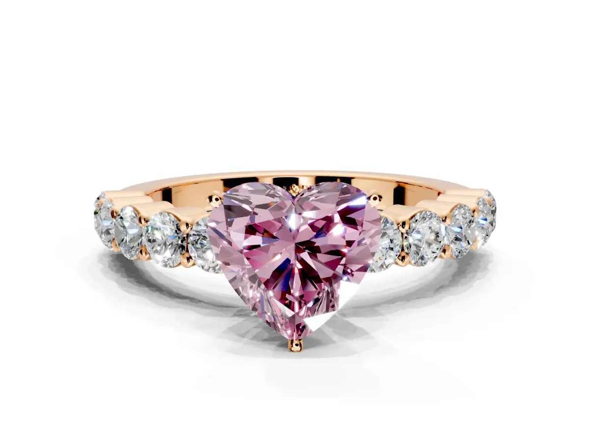 Shared-Prong Engagement Ring Setting for Fancy Pink Heart-Shaped Center with Graduated Accents and Prong Head in Rose Gold