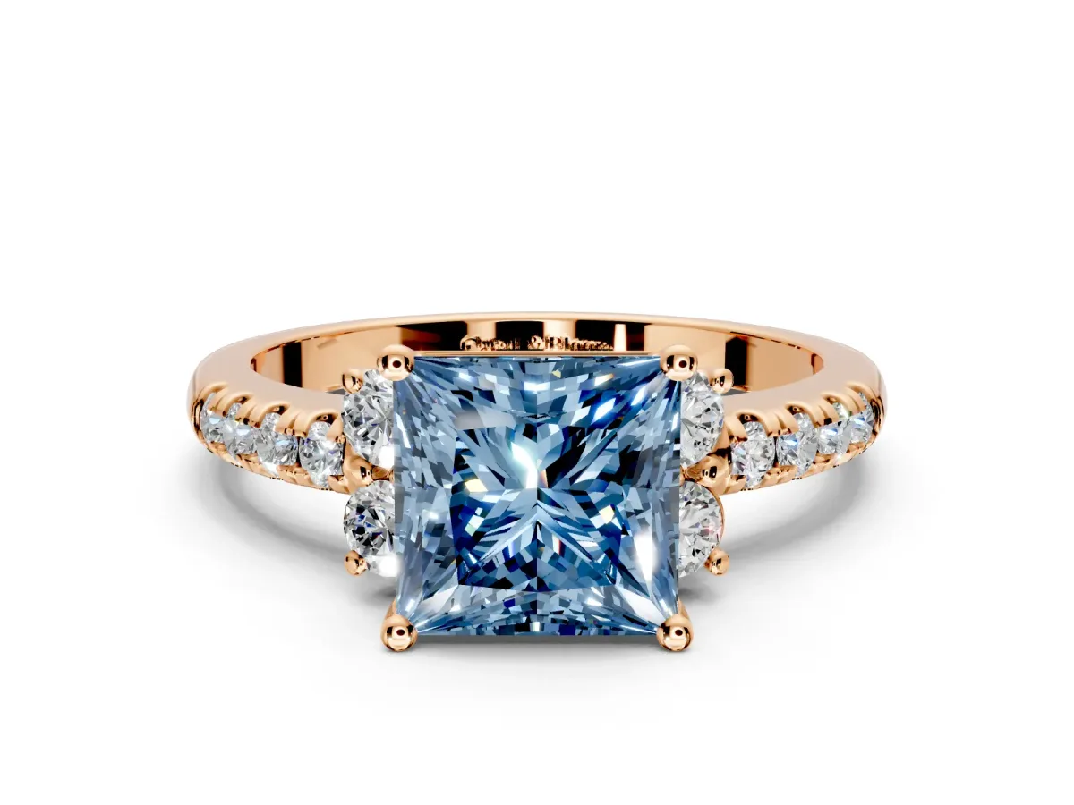Paired Accent Engagement Ring Setting for Fancy Blue Princess Cut Center with Pave Band and Prong Head in Rose Gold