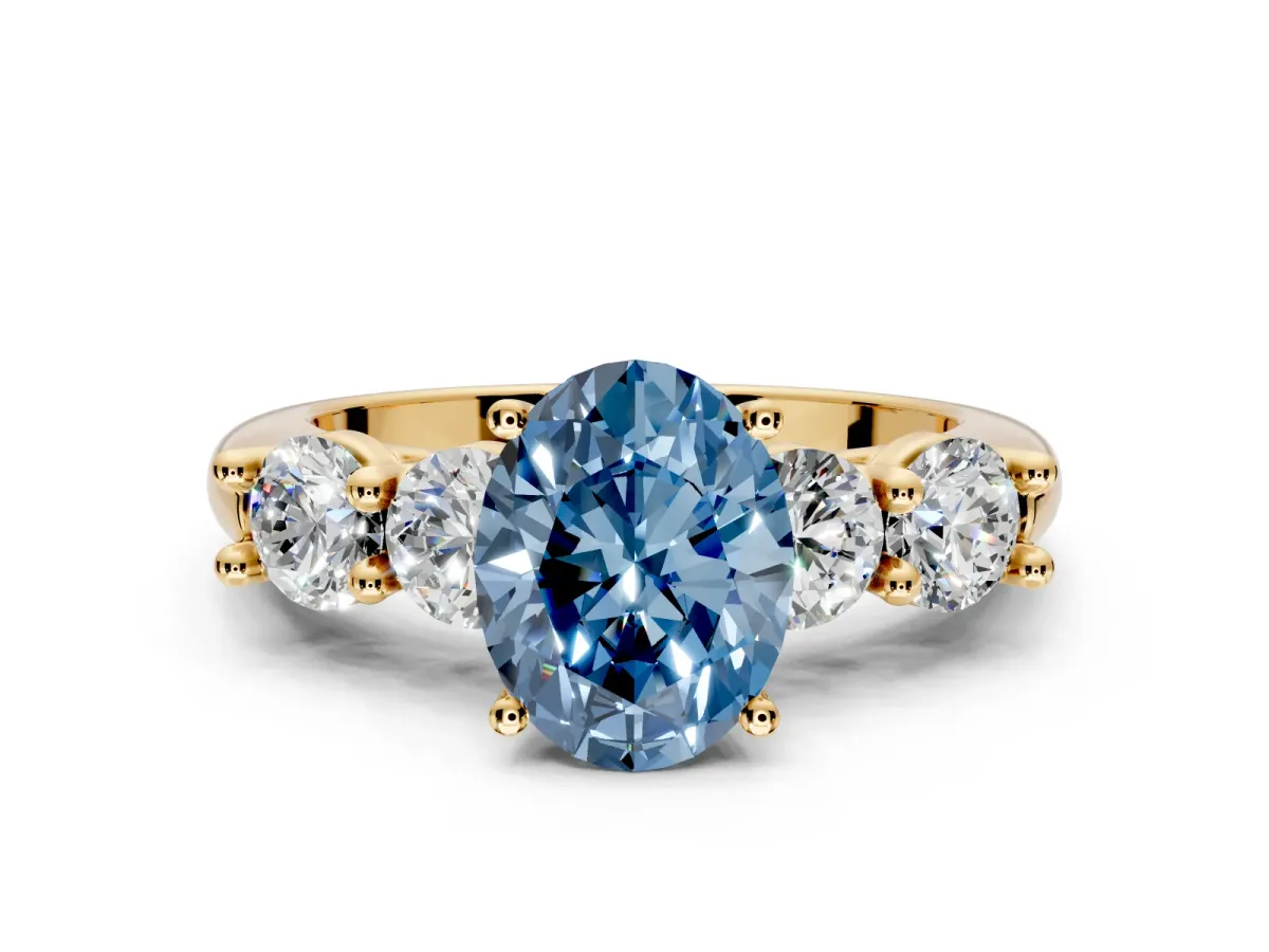 5 Stone Engagement Ring Setting for Fancy Blue Oval Center with Graduated Accents and Prong Head in Yellow Gold