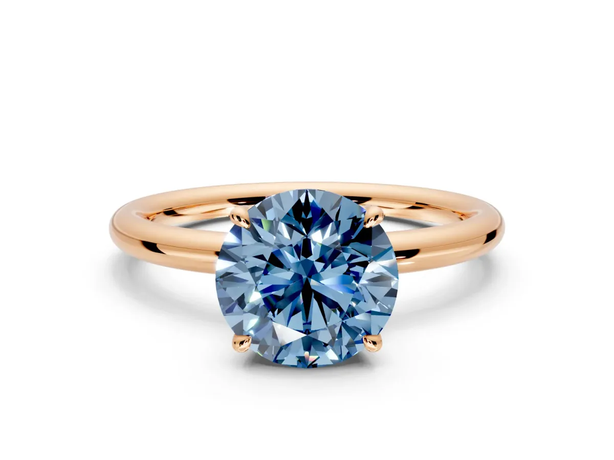 Hidden Halo Engagement Ring Setting for Fancy Blue Round Cut Center with Thin Rounded Band and Prong Head in Rose Gold