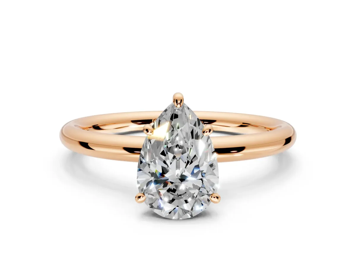 Low-Set Solitaire Engagement Ring Setting for Pear-Shaped Center with Thin Plain Band and Prong Head in Rose Gold