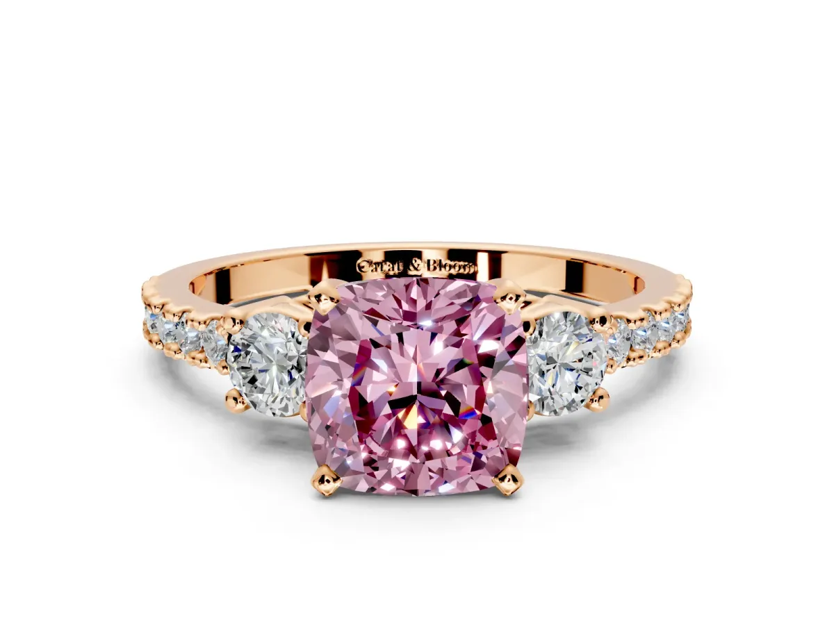 3 Stone Engagement Ring Setting for Fancy Pink Cushion Cut Center with Round Cut Side Accents and Prong Head in Rose Gold