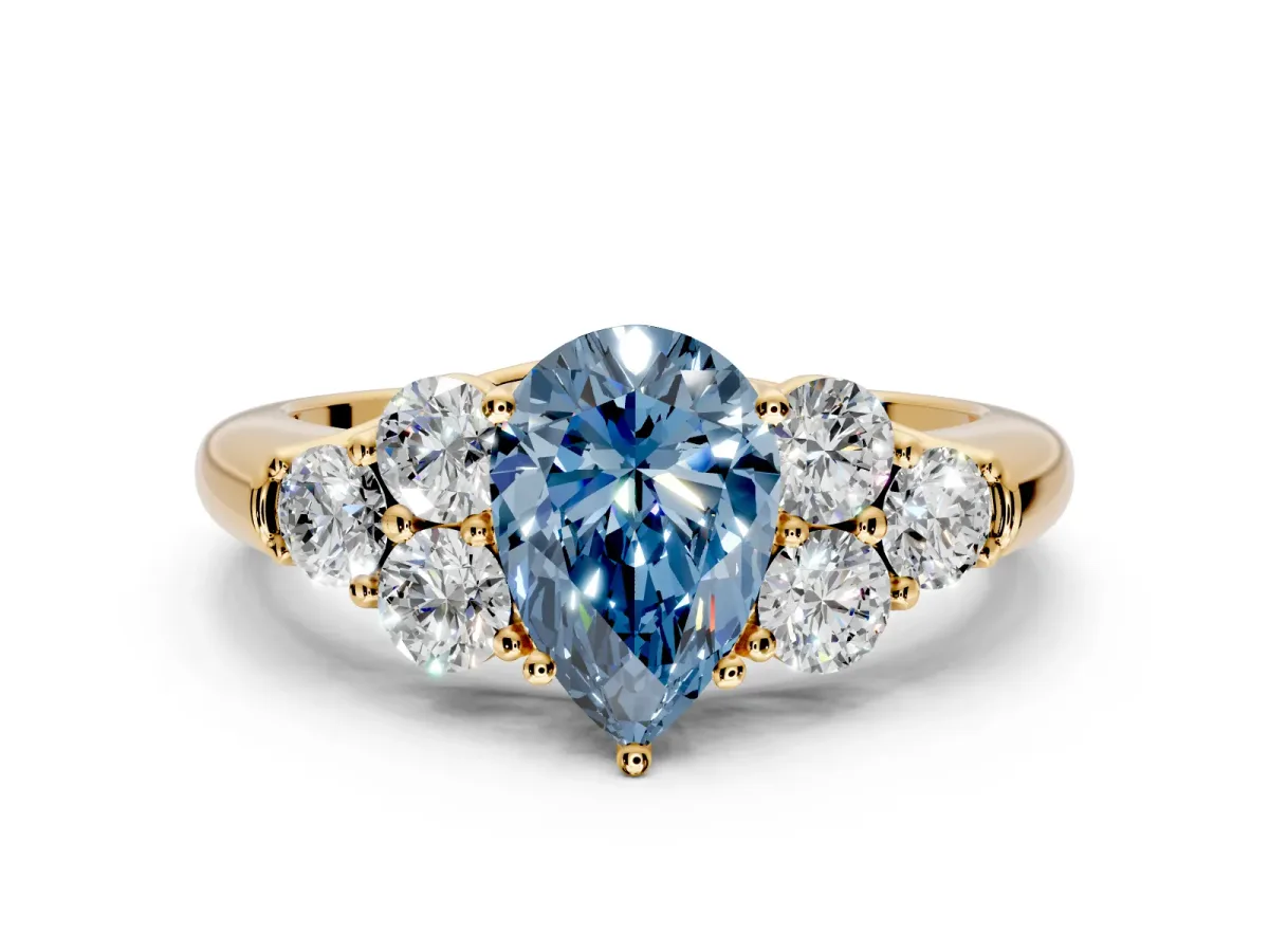 Cluster Engagement Ring Setting for Fancy Blue Pear-Shaped Center with Round Cut Accent Frame and Prong Head in Yellow Gold