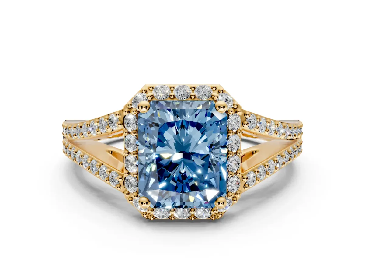 Halo Engagement Ring Setting for Fancy Blue Radiant Cut Center with Pave Split Shank and Prong Head in Yellow Gold