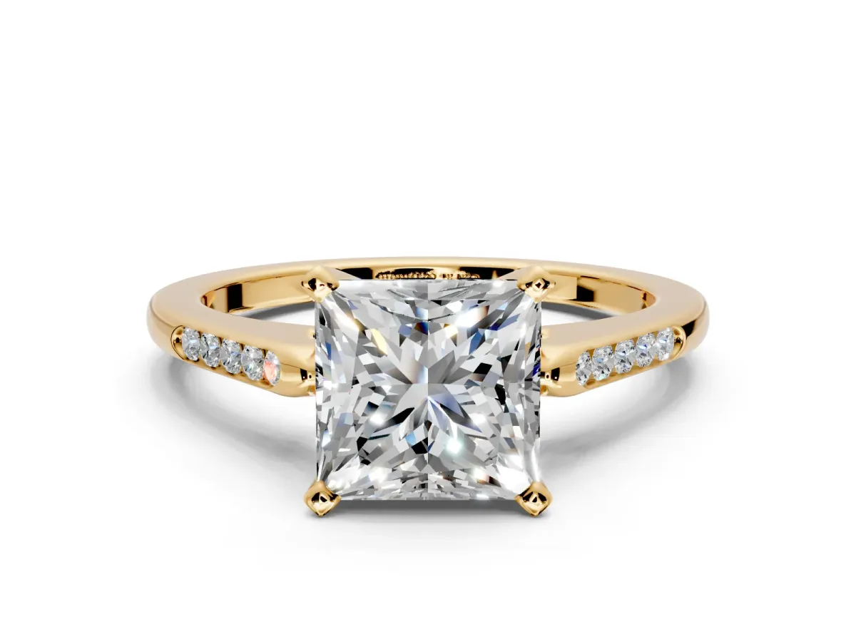 Solitaire Engagement Ring Setting for Princess Cut Center with Channel Accents and Prong Head in Yellow Gold