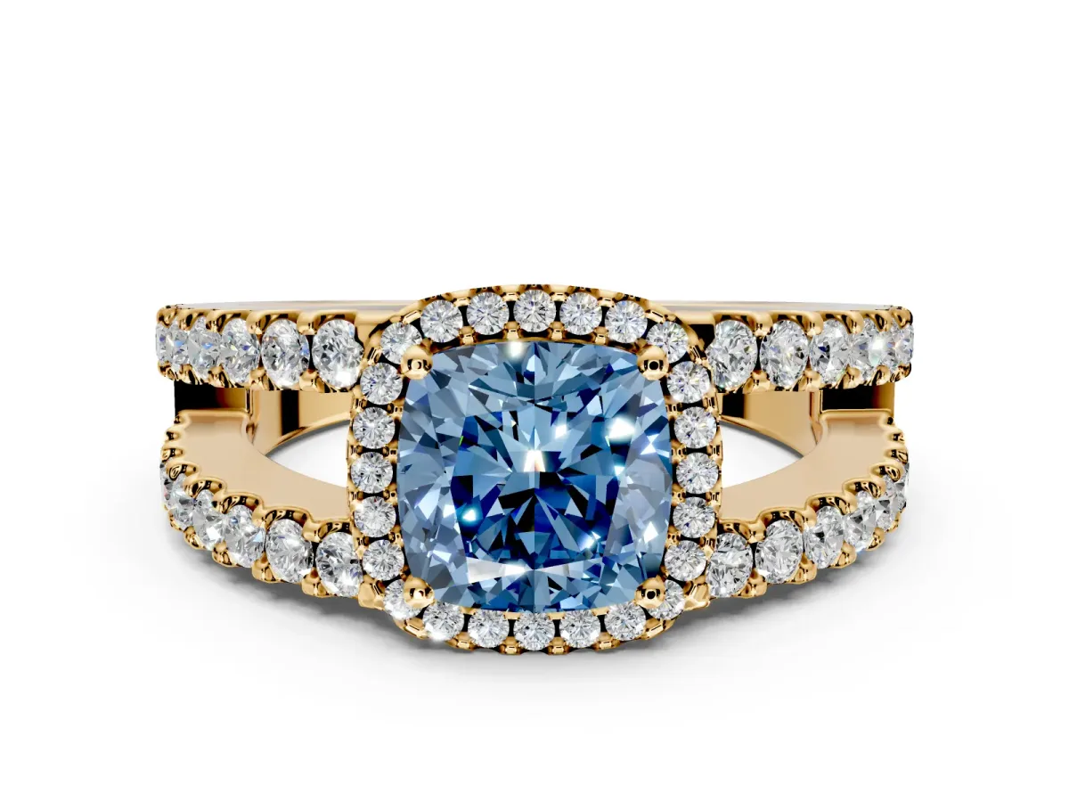Halo Engagement Ring Setting for Fancy Blue Cushion Cut Center with Wide-Open Pave Split Shank and Prong Head in Yellow Gold