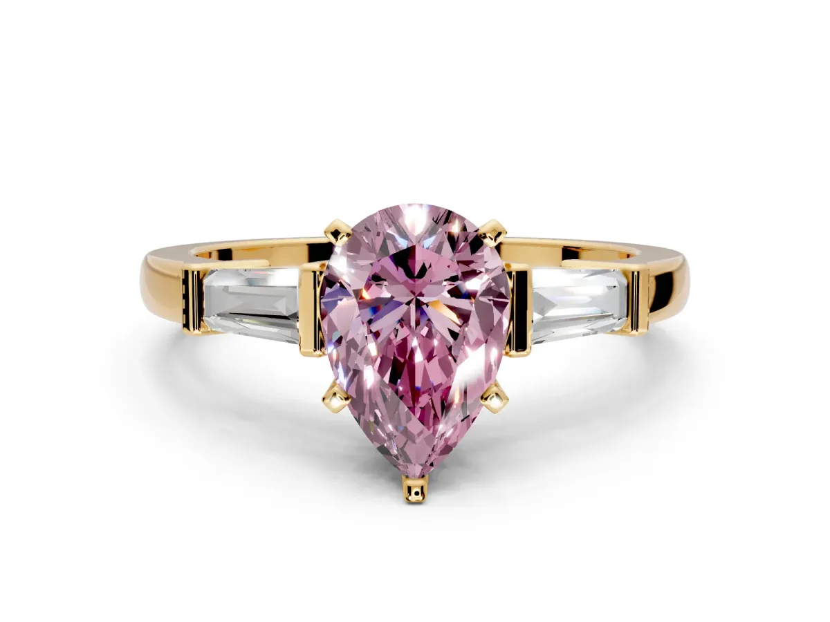3 Stone Engagement Ring Setting for Fancy Pink Pear-Shaped Center with Channel Baguette Accents and Prong Head in Yellow Gold