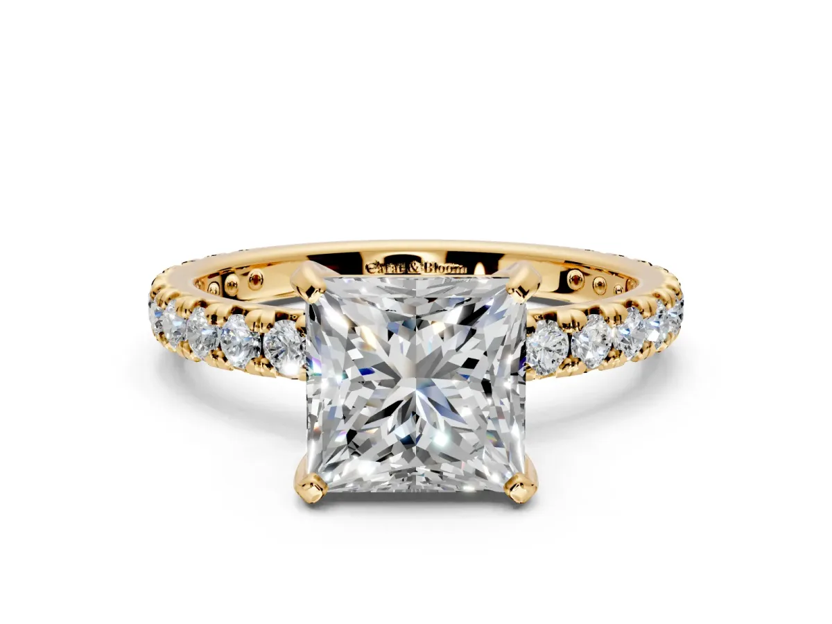Solitaire Engagement Ring Setting for Princess Cut Center with Shared-Prong Accents and Prong Head in Yellow Gold
