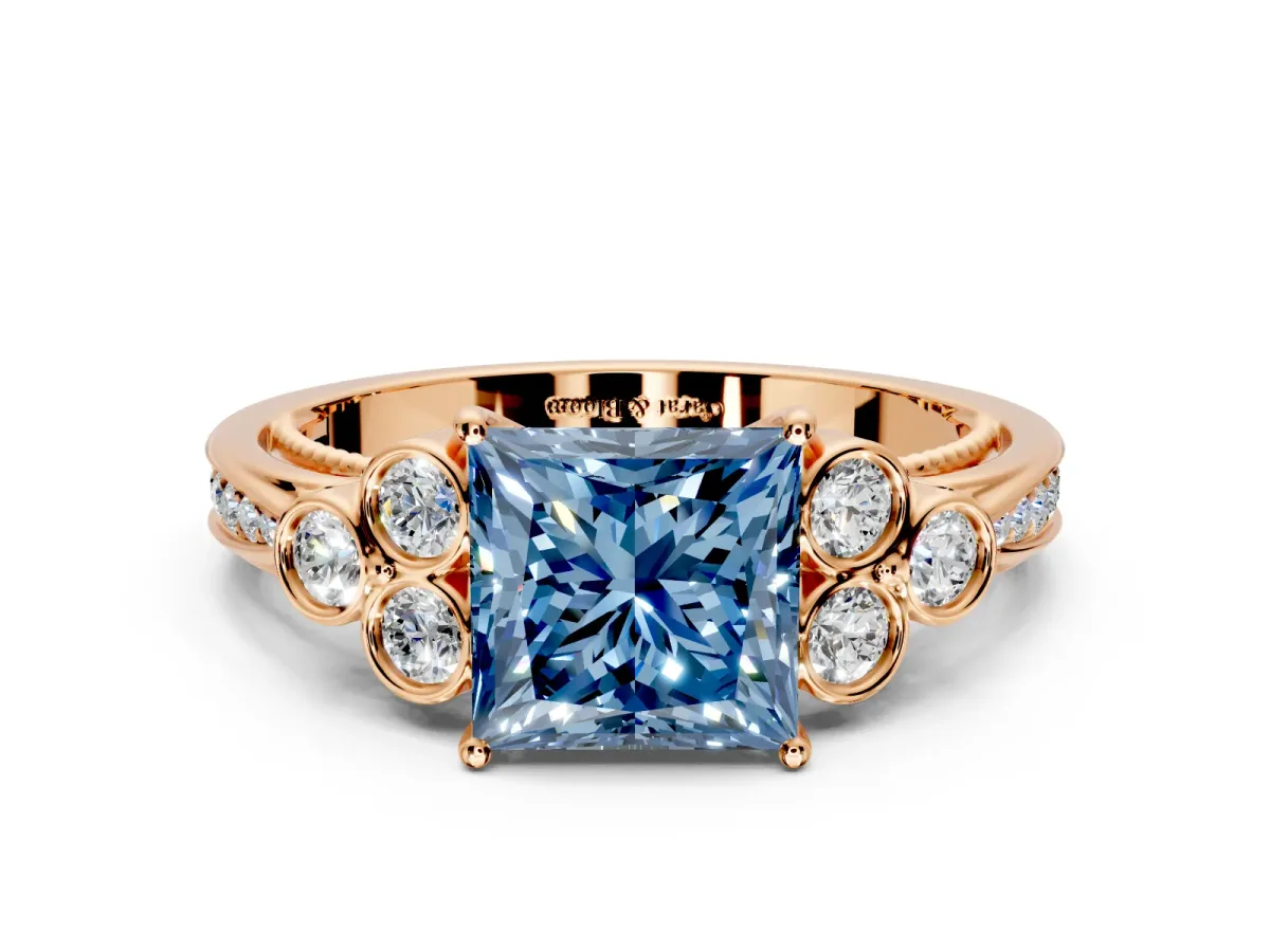 Cluster Engagement Ring Setting for Fancy Blue Princess Cut Center with Bezel Accent Clusters and Prong Head in Rose Gold