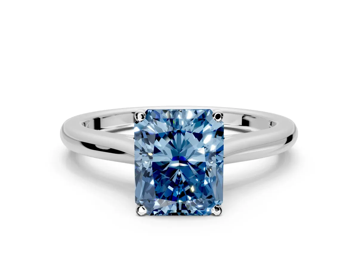 Solitaire Engagement Ring Setting for Fancy Blue Radiant Cut Center with Narrow Cathedral Band and Prong Head in White Gold