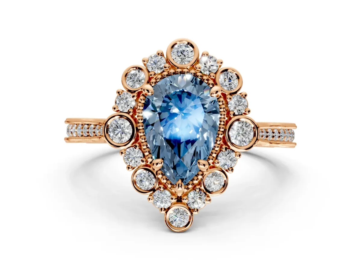 Milgrain Halo Engagement Ring Setting for Fancy Blue Pear-Shaped Center with Bezel Point Accents and Prong Head in Rose Gold