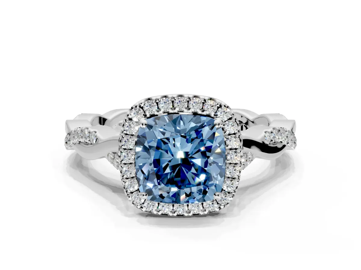 Halo Engagement Ring Setting for Fancy Blue Cushion Cut Center with Twist Band and Prong Head in White Gold