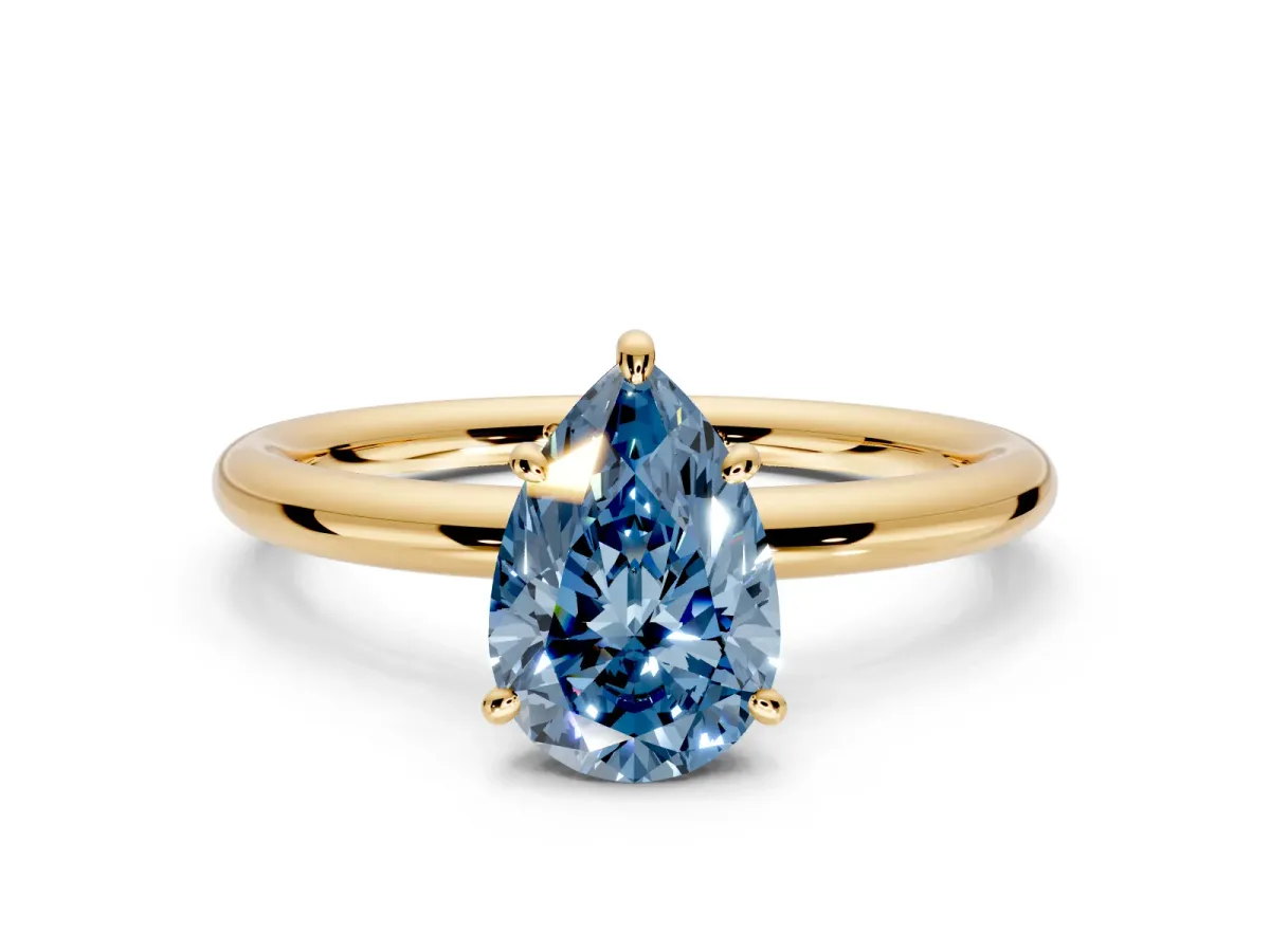 Low-Set Solitaire Engagement Ring Setting for Fancy Blue Pear-Shaped Center with Thin Plain Band and Prong Head in Yellow Gold