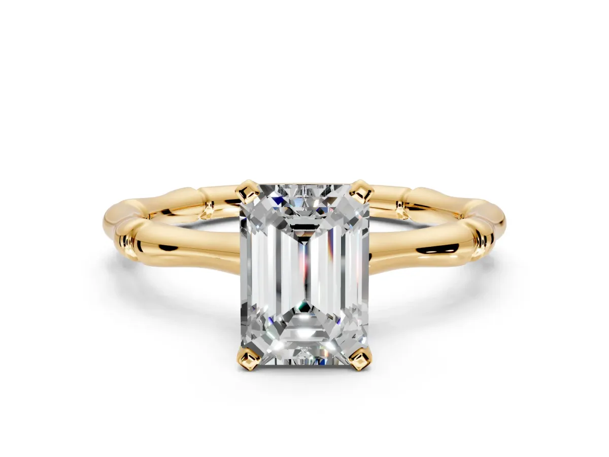 Solitaire Engagement Ring Setting for Emerald Cut Center with Bamboo Band and Prong Head in Yellow Gold