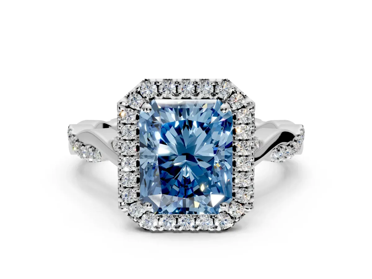 Halo Engagement Ring Setting for Fancy Blue Radiant Cut Center with Twist Band and Prong Head in Platinum