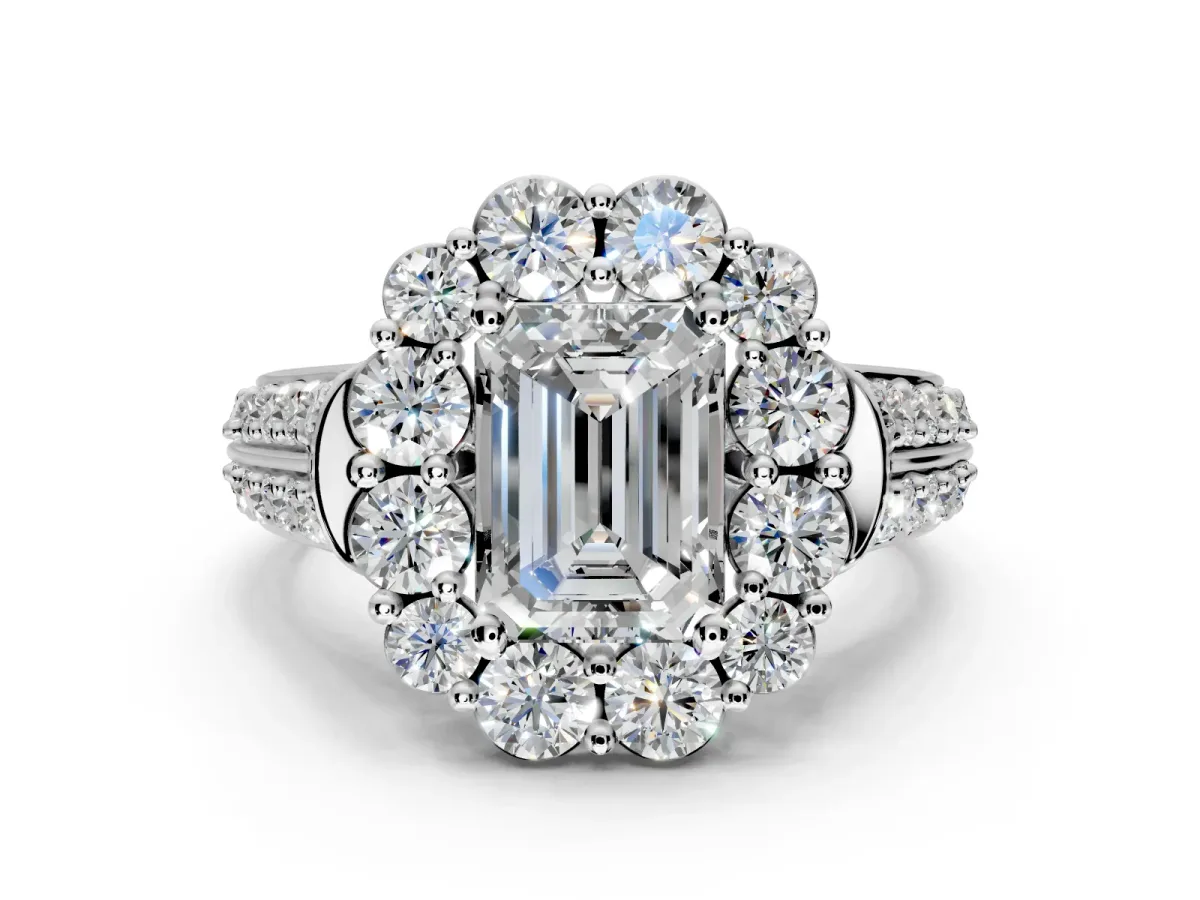 Large Accent Halo Engagement Ring Setting for Emerald Cut Center with Pave Split Shank and Prong Head in Platinum