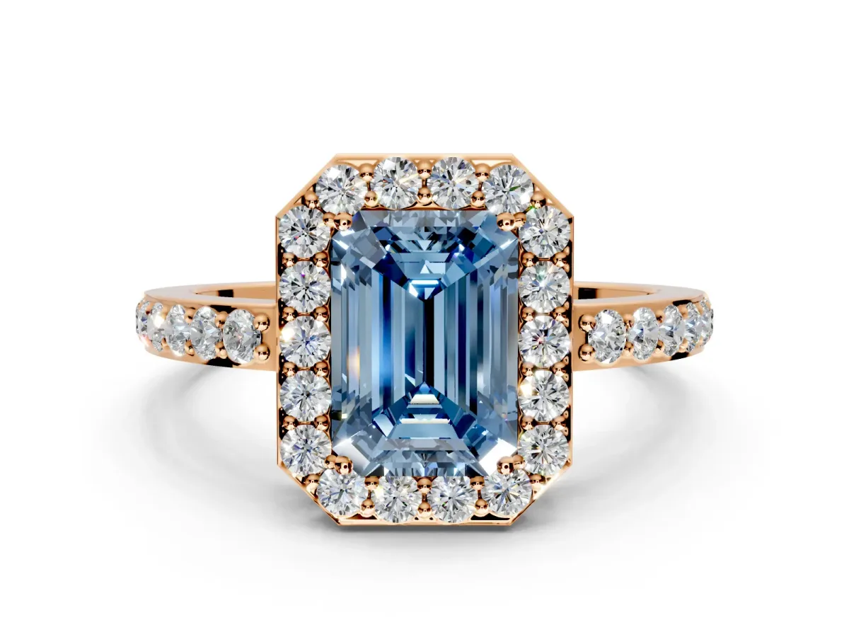 Halo Engagement Ring Setting for Fancy Blue Emerald Cut Center with Heart-Shaped Openwork, Pave Band and Prong Head in Rose Gold