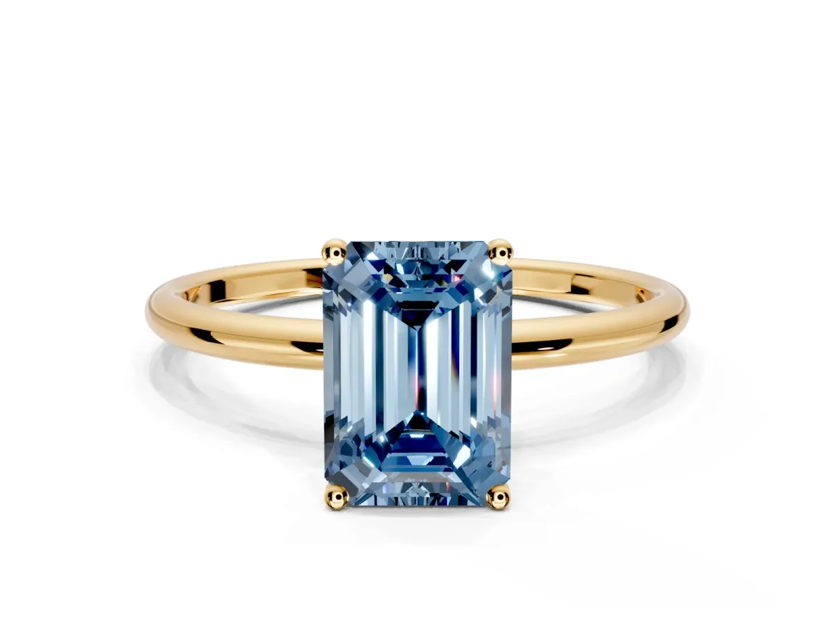 Solitaire Engagement Ring Setting for Fancy Blue Emerald Cut Center with Straight Thin Band and Prong Head in Yellow Gold