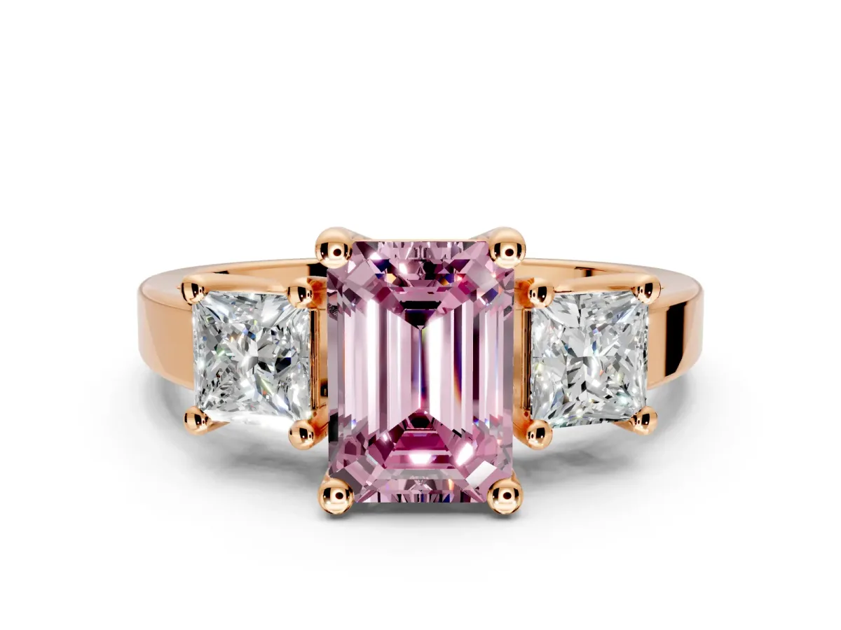 3 Stone Engagement Ring Setting for Fancy Pink Emerald Cut Center with Matching Side Accents and Prong Head in Rose Gold