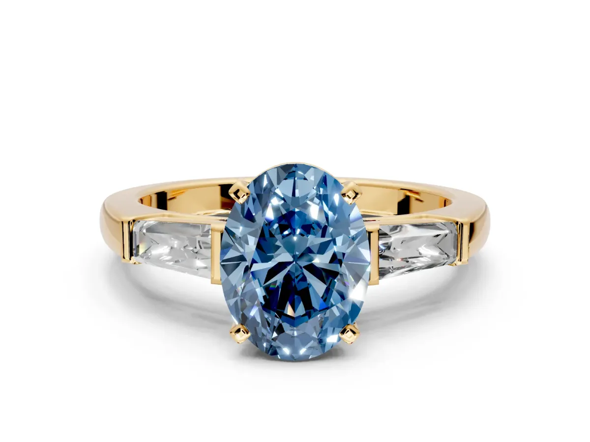 3 Stone Engagement Ring Setting for Fancy Blue Oval Center with Tapered Baguettes, Plain Band and Prong Head in Yellow Gold