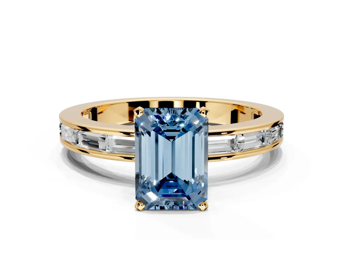 Solitaire Engagement Ring Setting for Fancy Blue Emerald Cut Center with Channel Baguette Band and Prong Head in Yellow Gold