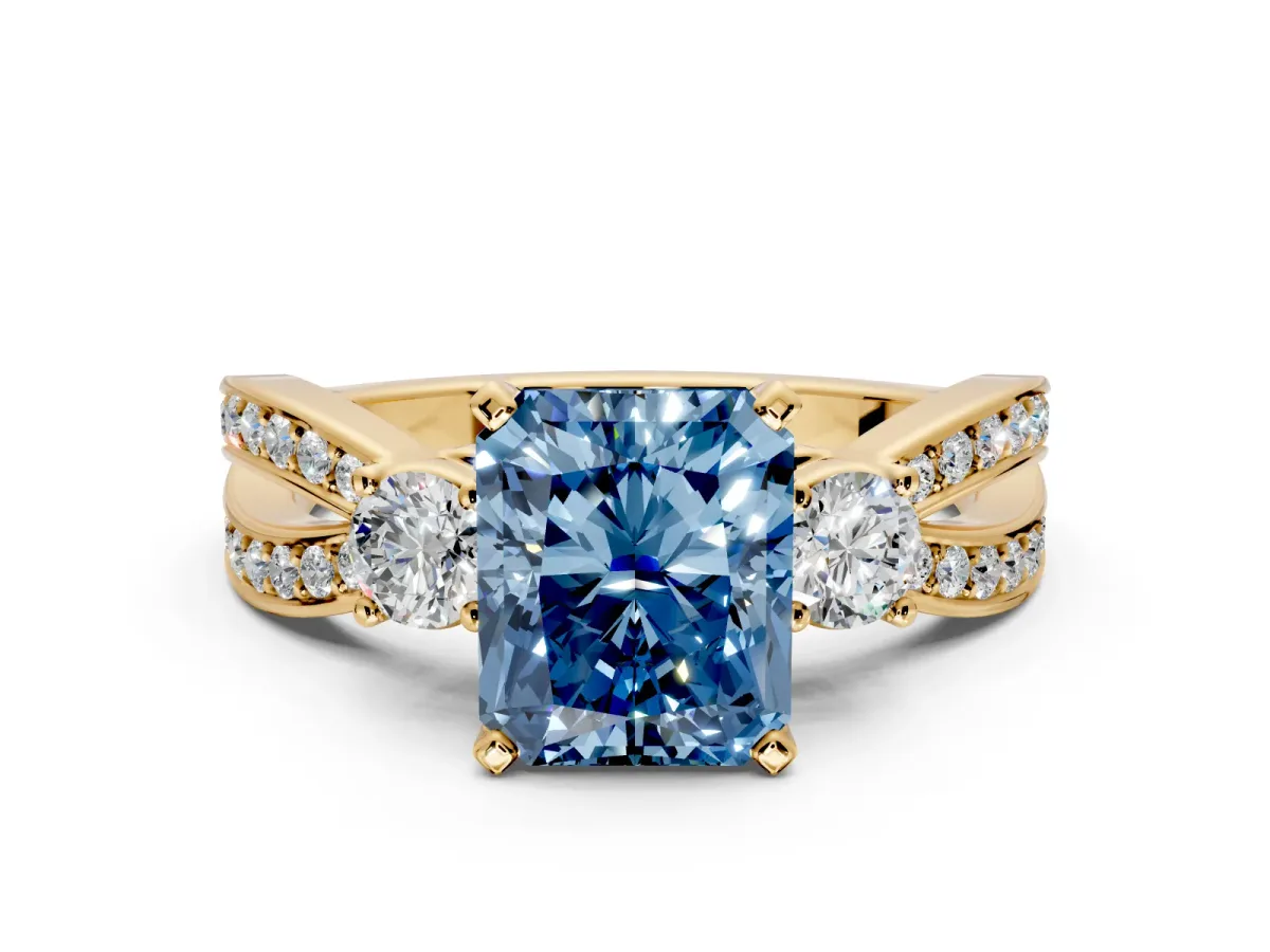3 Stone Engagement Ring Setting for Fancy Blue Radiant Cut Center with Pave Twist Band and Prong Head in Yellow Gold