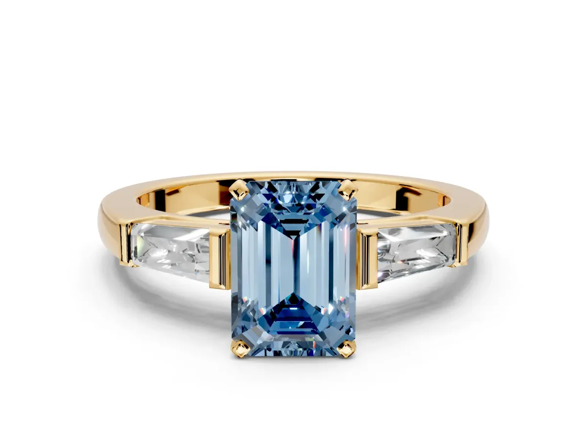 3 Stone Engagement Ring Setting for Fancy Blue Emerald Cut Center with Tapered Baguettes, Plain Band and Prong Head in Yellow Gold