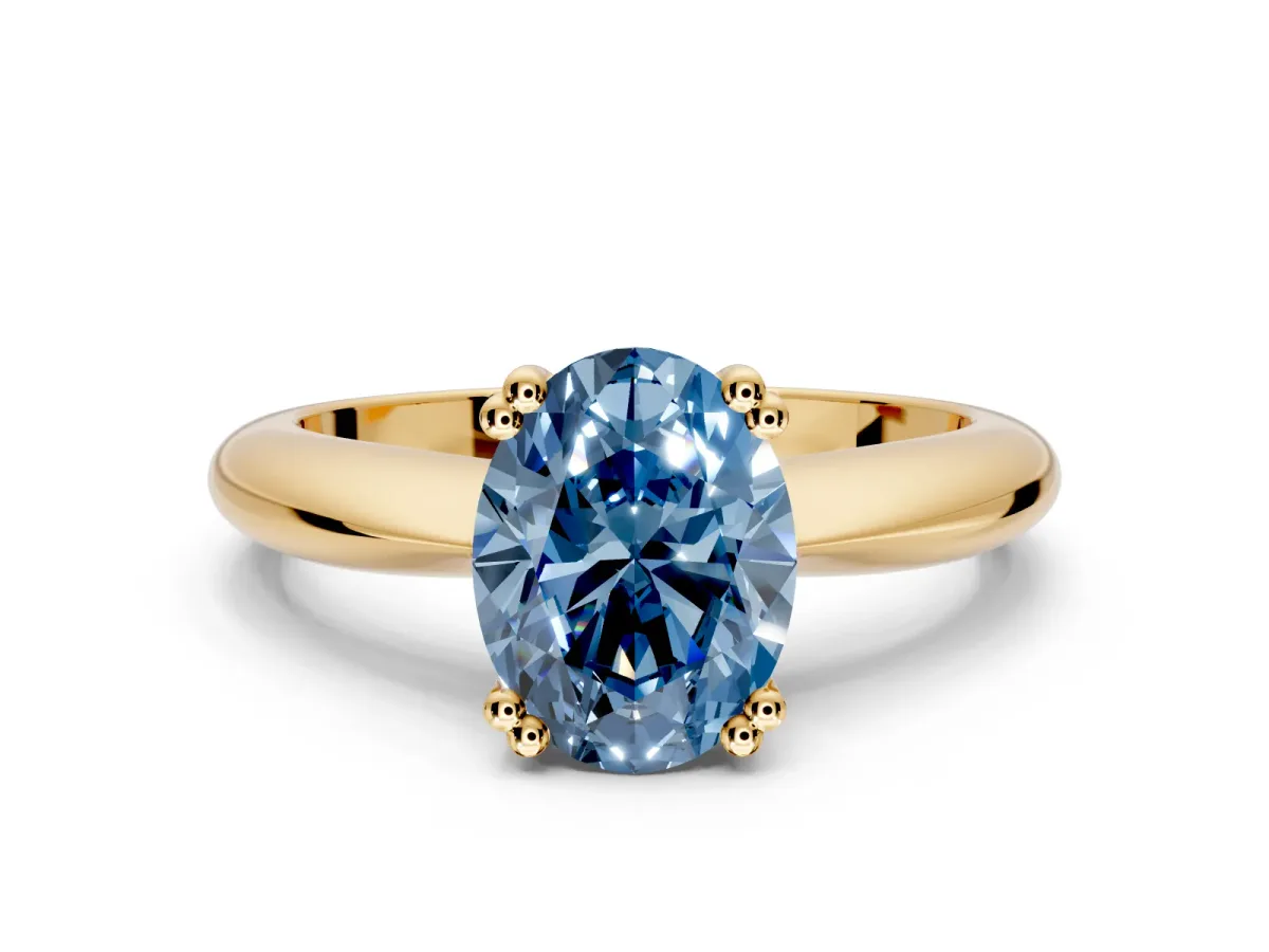Solitaire Engagement Ring Setting for Fancy Blue Oval Center with Reverse Tapered Band and Prong Head in Yellow Gold