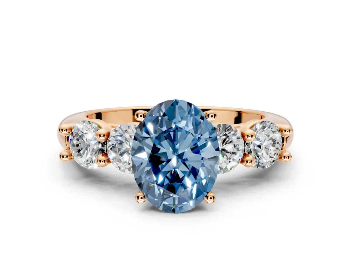 5 Stone Engagement Ring Setting for Fancy Blue Oval Center with Graduated Accents and Prong Head in Rose Gold