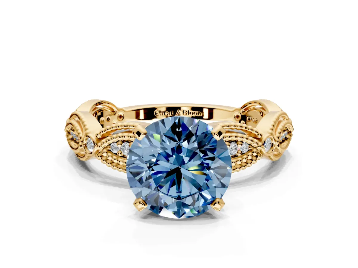 Solitaire Engagement Ring Setting for Fancy Blue Round Cut Center with Marquise Panel Band and Prong Head in Yellow Gold