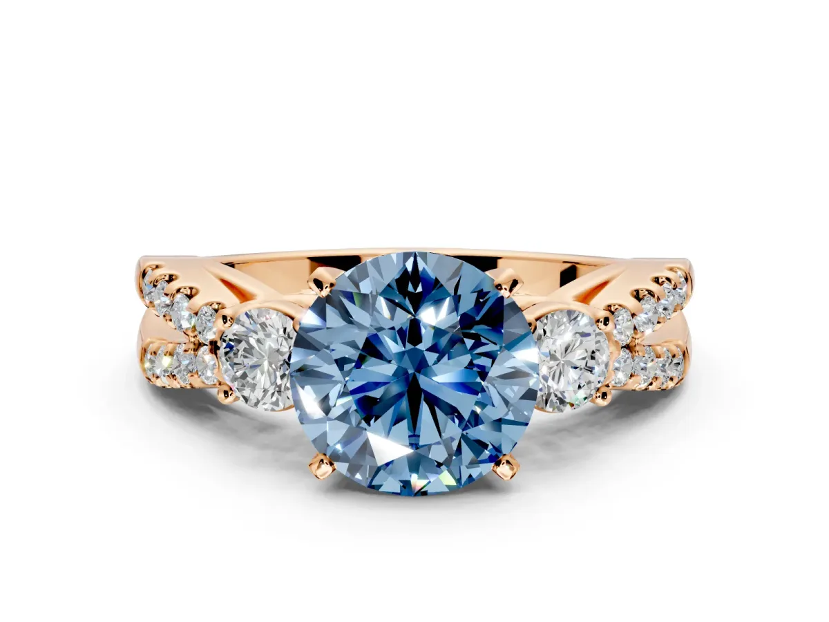3 Stone Engagement Ring Setting for Fancy Blue Round Cut Center with Pave Split Shank and Prong Head in Rose Gold