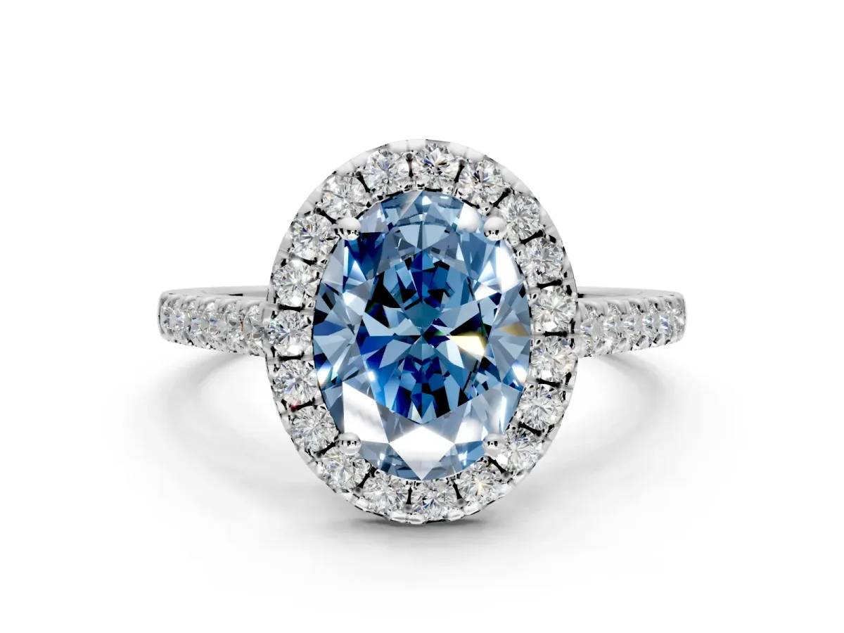 Halo Engagement Ring Setting for Fancy Blue Oval Center with Narrowing Pave Band and Prong Head in White Gold