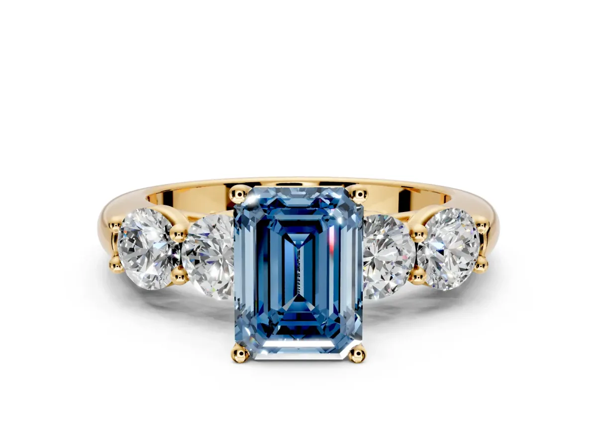 5 Stone Engagement Ring Setting for Fancy Blue Emerald Cut Center with Graduated Accents and Prong Head in Yellow Gold