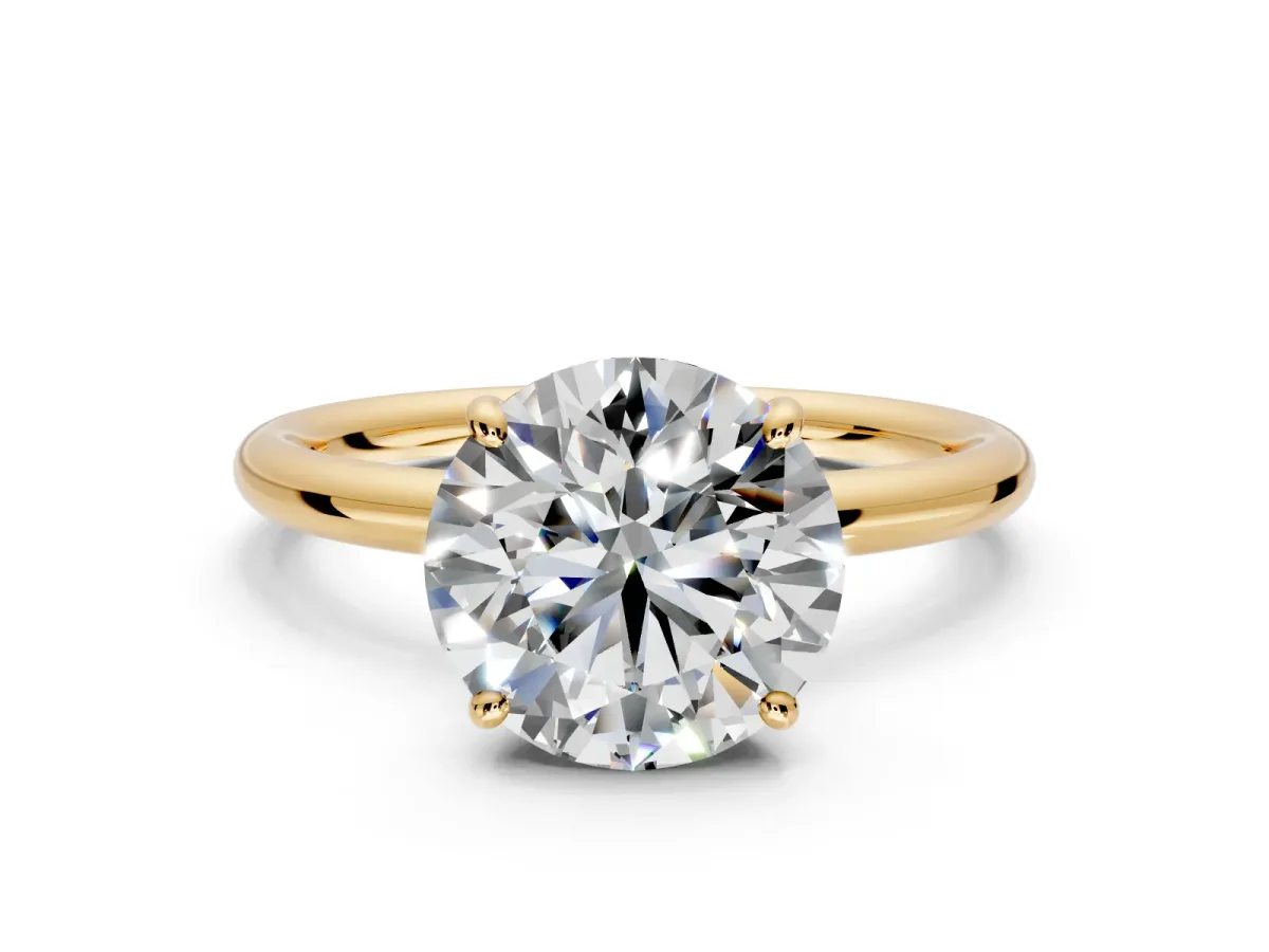 Low-Set Solitaire Engagement Ring Setting for Round Cut Center with Thin Plain Band and Prong Head in Yellow Gold