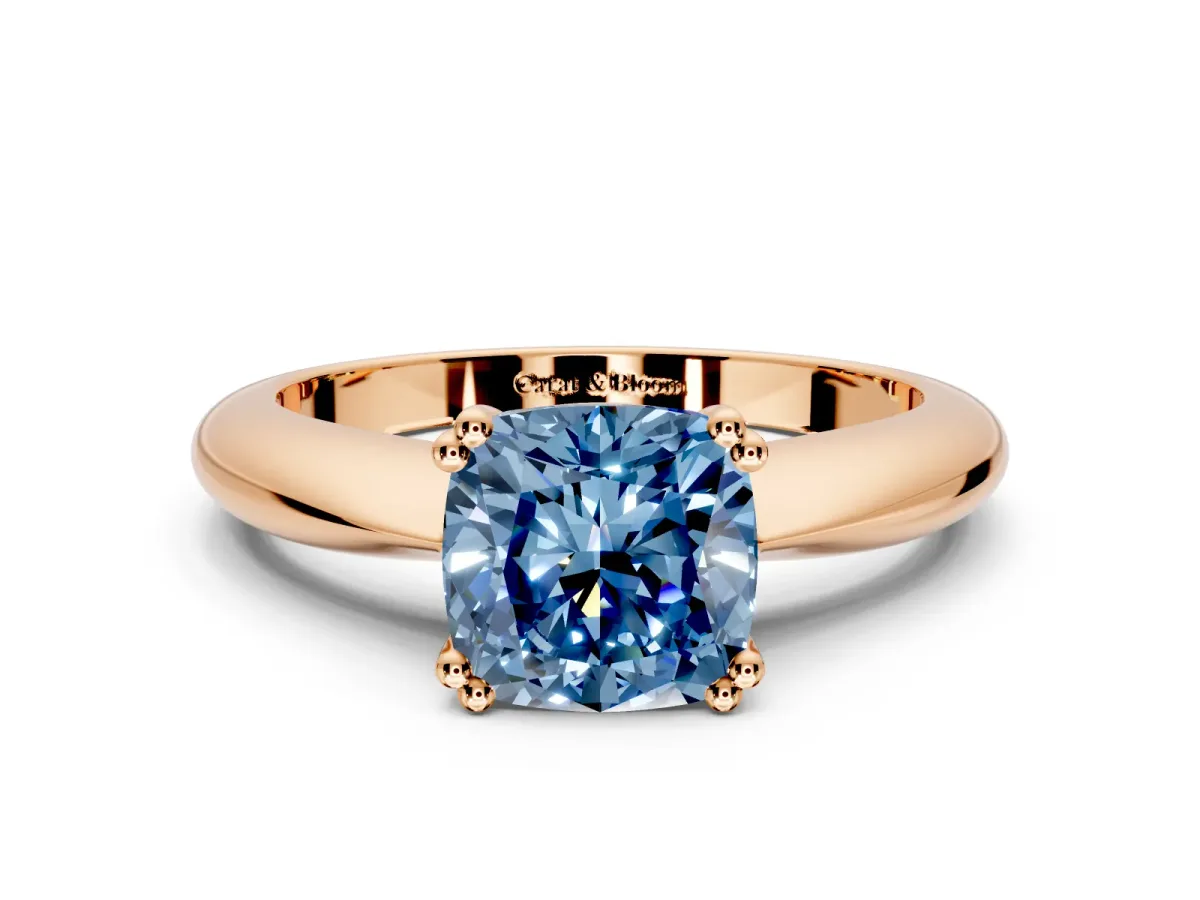 Solitaire Engagement Ring Setting for Fancy Blue Cushion Cut Center with Reverse Tapered Band and Prong Head in Rose Gold
