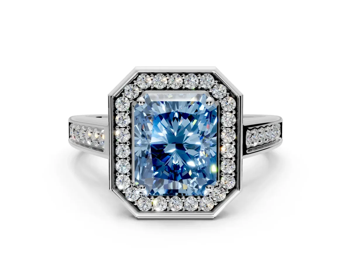 Halo Engagement Ring Setting for Fancy Blue Radiant Cut Center with Outer Bezel Rim, Pave Band and Prong Head in White Gold