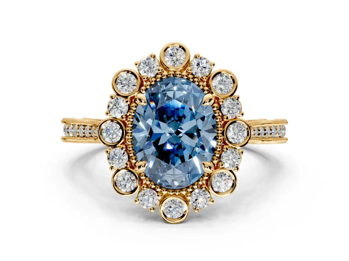 Milgrain Halo Engagement Ring Setting for Fancy Blue Oval Center with Bezel Point Accents and Prong Head in Yellow Gold