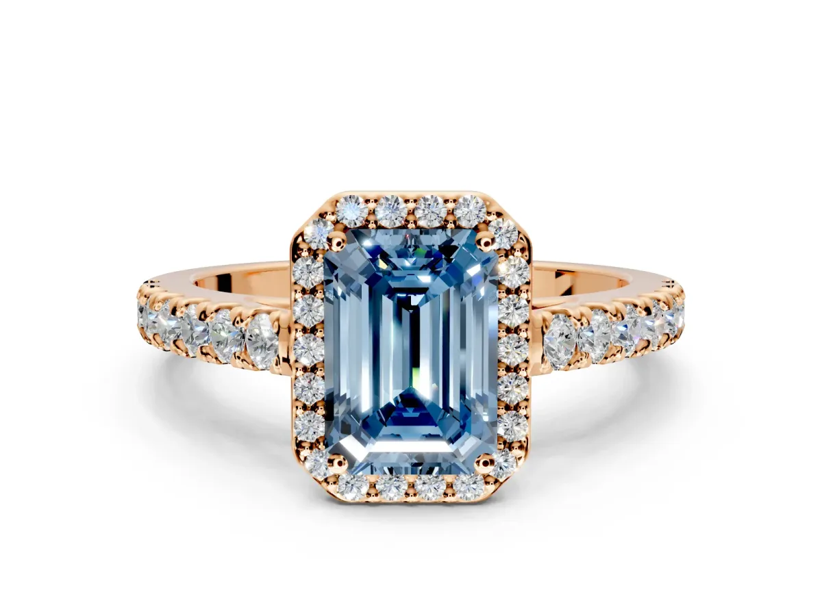 Halo Engagement Ring Setting for Fancy Blue Emerald Cut Center with Full Pave Band and Prong Head in Rose Gold