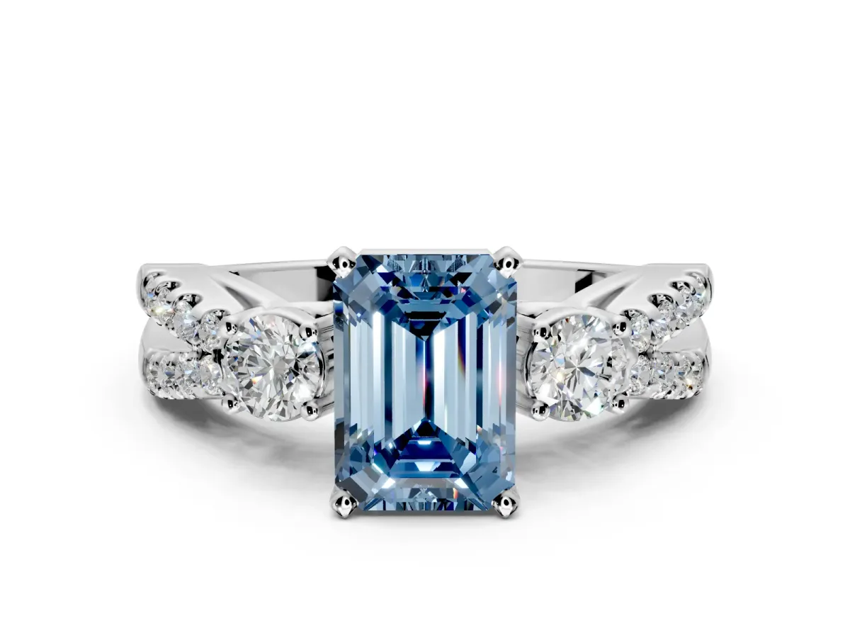 3 Stone Engagement Ring Setting for Fancy Blue Emerald Cut Center with Pave Split Shank and Prong Head in White Gold