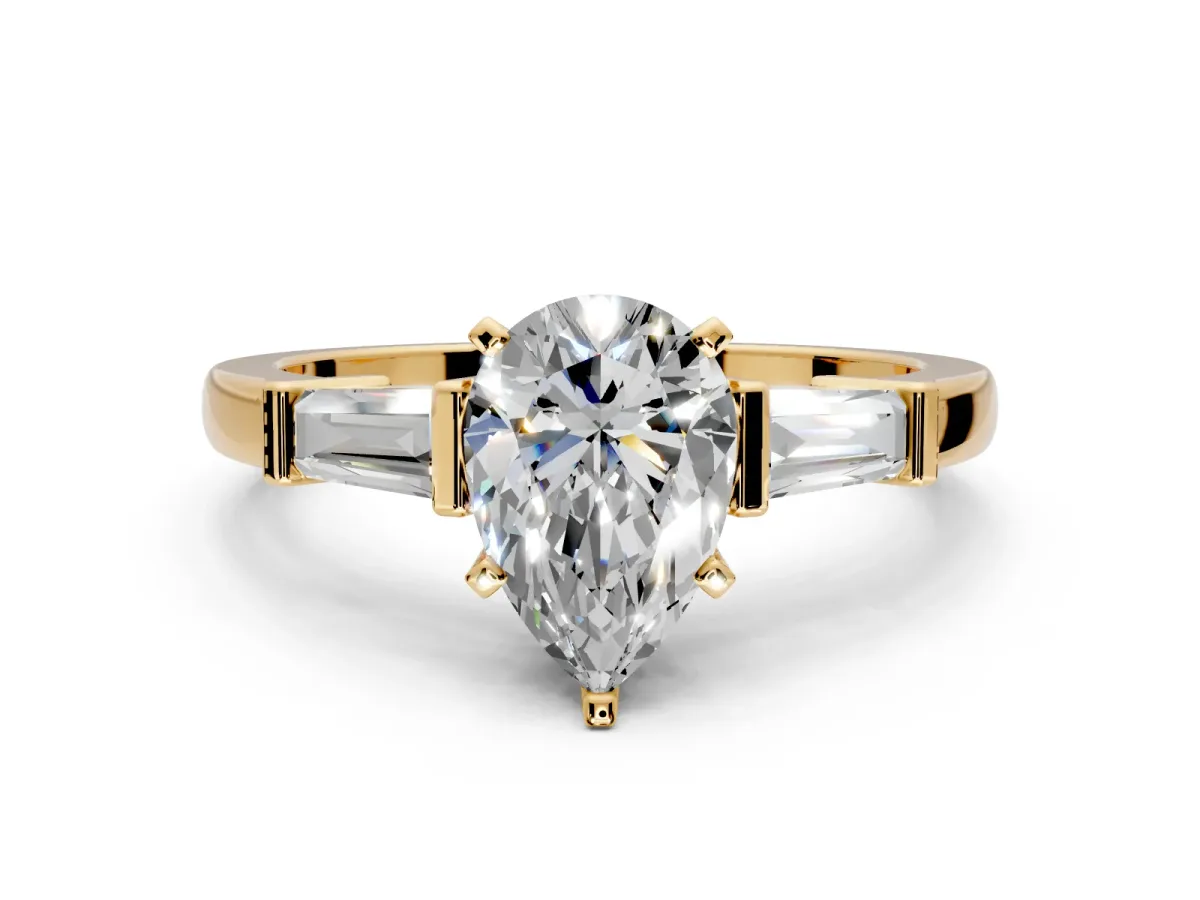 3 Stone Engagement Ring Setting for Pear-Shaped Center with Channel Baguette Accents and Prong Head in Yellow Gold