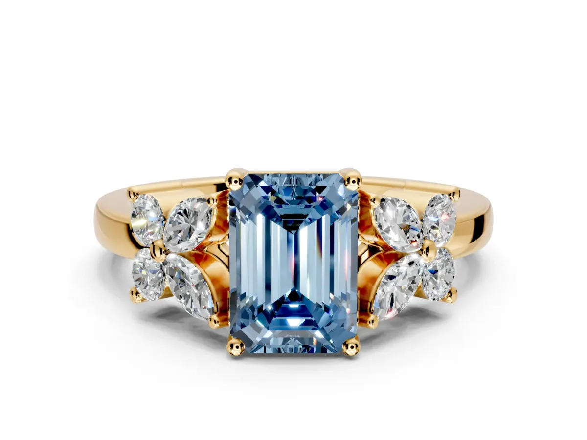 Floral Engagement Ring Setting for Fancy Blue Emerald Cut Center with Marquise Cluster Shoulders and Prong Head in Yellow Gold