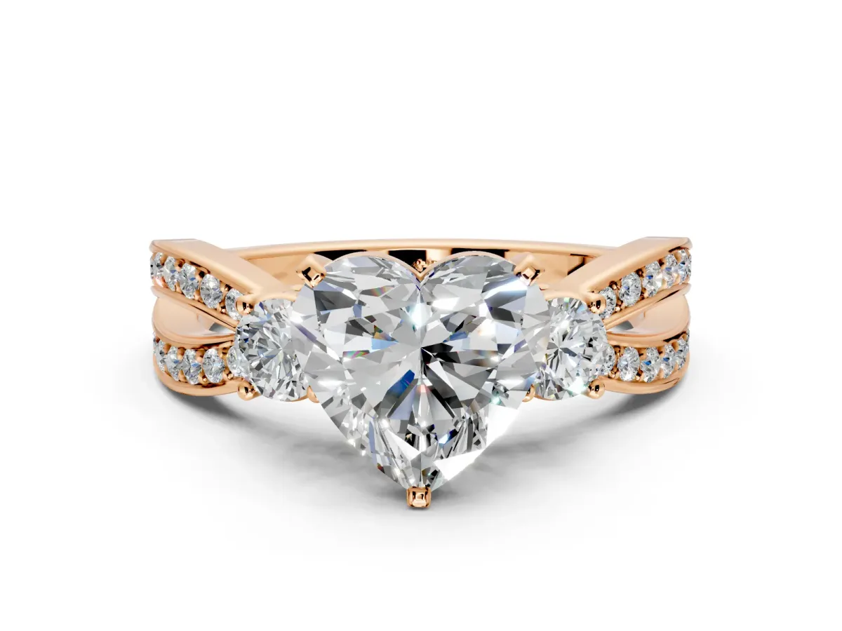 3 Stone Engagement Ring Setting for Heart-Shaped Center with Pave Twist Band and Prong Head in Rose Gold